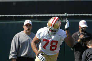 Lawrence Okoye going through a drill during his first NFL practice.