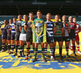 The twelve captains pose with the Aviva Premiership trophy, the season's ultimate prize.