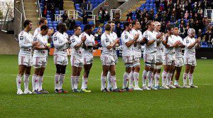 Stade players listen to the French National anthem