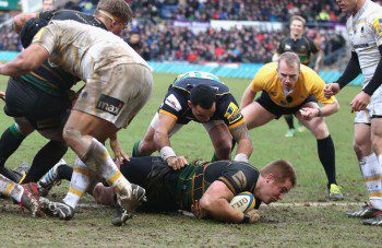 Northampton charged through Worcester to maintain their grip on the top.