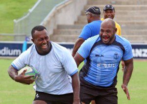 The late Iosefo Bele Tabalala, left, shares a light moment with Isireli Ledua during the Telecom Fiji Warriors captain's run on Tuesday before the World Rugby Pacific Challenge match against Samoa on Wednesday. Picture: ATU RASEA