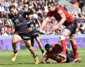 Luke McAlister breaks for Toulouse in their Top 14 play-off win over Oyonnax