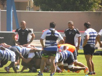 Joe El-Abd (left) and Christophe Urios watch a scrum during a training session at Castres' Stade Pierre Antoine