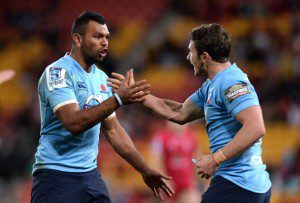 Waratahs giving each other the 'thumbs-up high-five' combo.