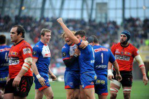 Grenoble celebrate Charl McLeod's try in the Top 14  victory over Oyonnax