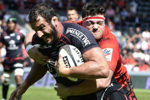 Yoann Maestri is tackled by Antoine Tichit in the Top 14 play-off at Stade Ernest Wallon