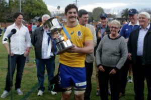 Brisbane City captain Liam Gill with the Andy Purcell Cup