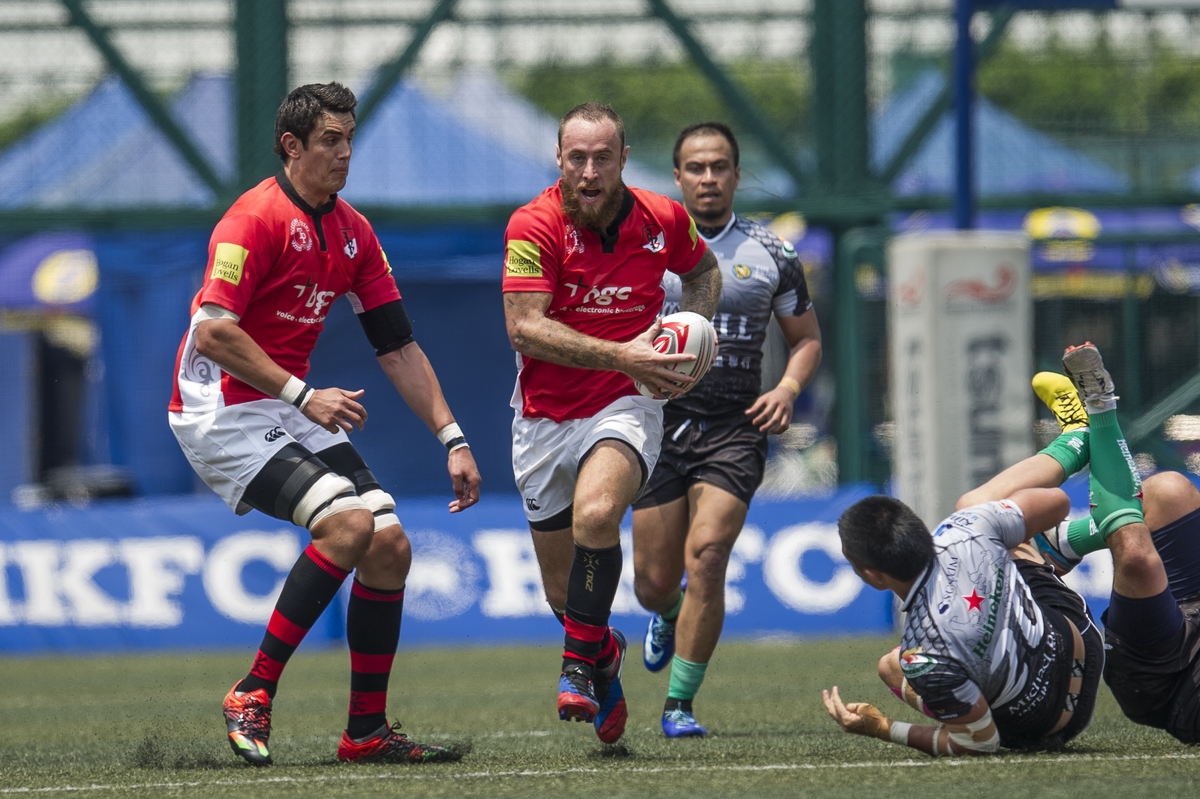 BCG Asia Pacific Dragons (in red) defeat Devils Own Shanghai Rugby (in grey) 48 to 0 during day 1 of GFI HKFC Rugby Tens 2016 on 06 April 2016 at Hong Kong Football Club in Hong Kong, China. Photo by Juan Manuel Serrano / Power Sport Images